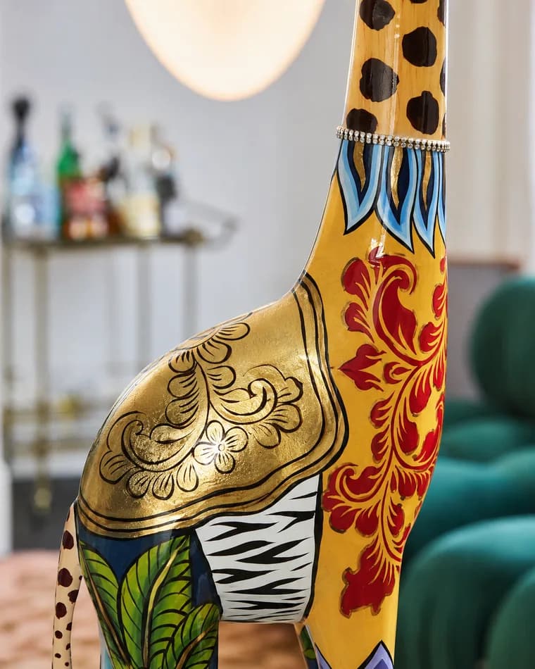 Gold leaf being applied to a finished character